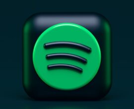 Badge Verified by Spotify para artistas humanos vs música gerada por IA